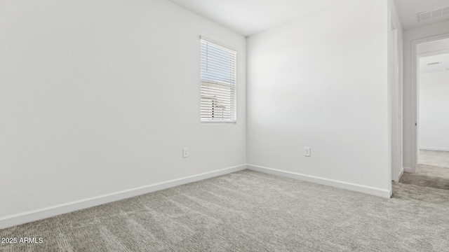 2316 W Moody Trl, Phoenix, AZ 85041 - carpeted empty room featuring plenty of natural light and baseboards