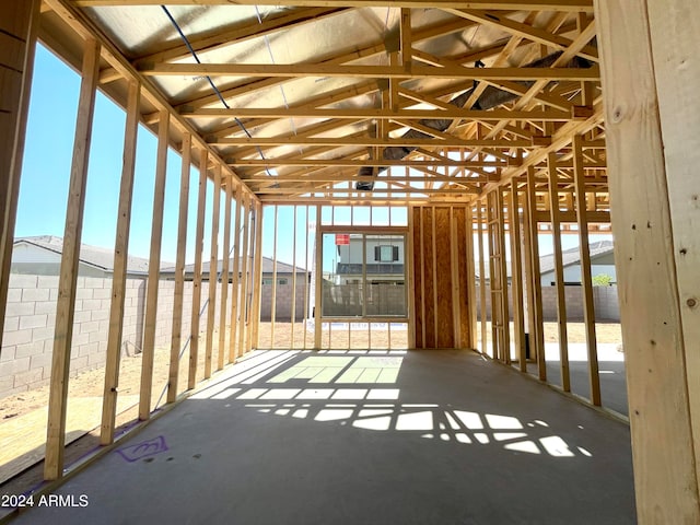 miscellaneous room featuring lofted ceiling