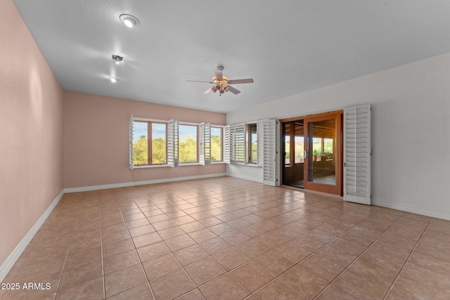 1503 N Thrasher Ln, Wickenburg, AZ 85390 - empty room with ceiling fan and light tile patterned floors