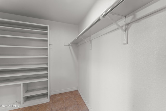 1503 N Thrasher Ln, Wickenburg, AZ 85390 - walk in closet featuring tile patterned floors