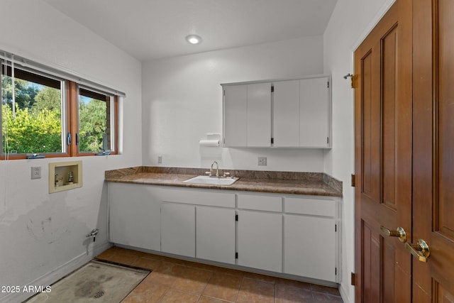 1503 N Thrasher Ln, Wickenburg, AZ 85390 - washroom with washer hookup, cabinet space, and light tile patterned floors