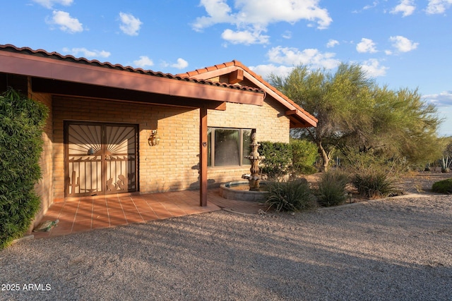 1503 N Thrasher Ln, Wickenburg, AZ 85390 - view of side of property featuring a tiled roof