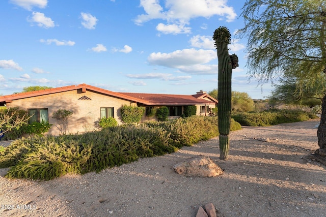1503 N Thrasher Ln, Wickenburg, AZ 85390 - view of side of property with brick siding