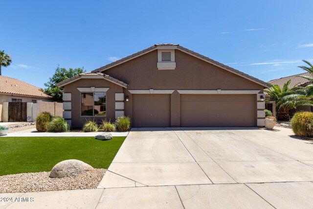 view of front of property with a front lawn