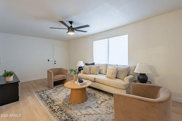 4740 E Portland St, Phoenix, AZ 85008 - living area featuring light wood-style flooring, baseboards, and ceiling fan