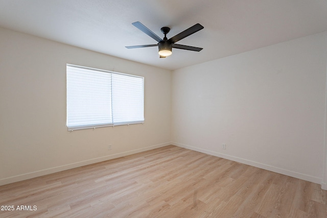 4740 E Portland St, Phoenix, AZ 85008 - spare room with light wood-style flooring, baseboards, and a ceiling fan