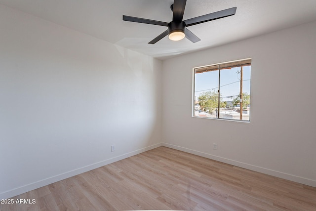 4740 E Portland St, Phoenix, AZ 85008 - spare room featuring a ceiling fan, baseboards, and light wood-style floors