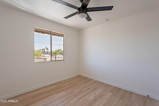 4740 E Portland St, Phoenix, AZ 85008 - empty room featuring light wood-type flooring, baseboards, and ceiling fan