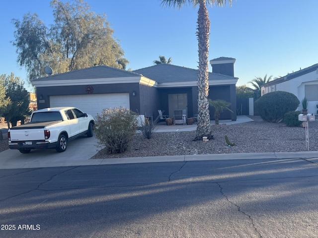 view of front of property featuring a garage