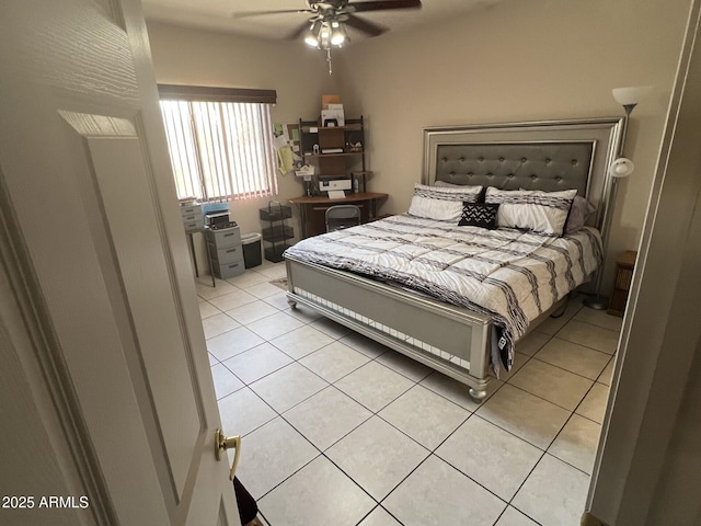 bedroom featuring light tile patterned flooring and ceiling fan