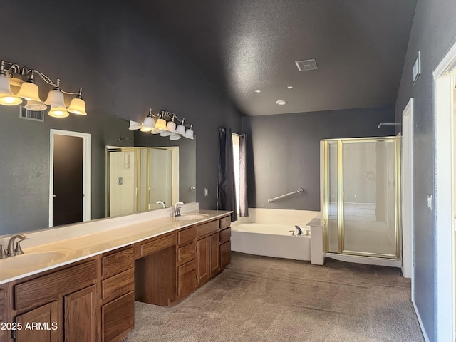 bathroom with a shower stall, a bath, a sink, visible vents, and lofted ceiling