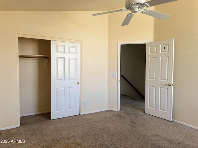 unfurnished bedroom featuring a closet, baseboards, and carpet floors