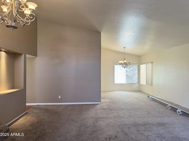 interior space with lofted ceiling, a chandelier, and baseboards