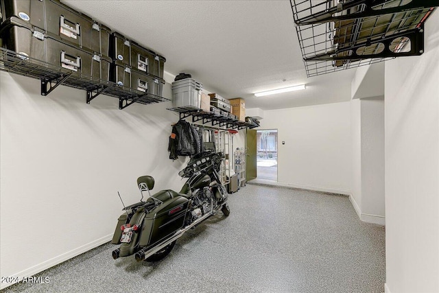 exercise room with a textured ceiling