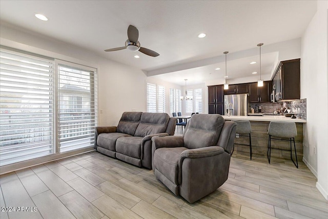 living room with ceiling fan