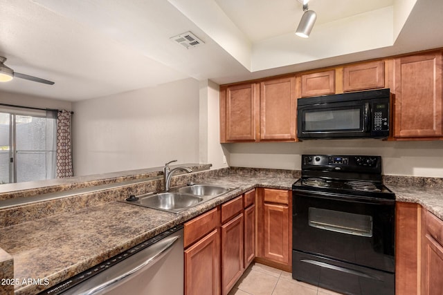 1331 W Baseline Rd Unit 167, Mesa, AZ 85202 - kitchen featuring black appliances, brown cabinetry, light tile patterned floors, and a ceiling fan