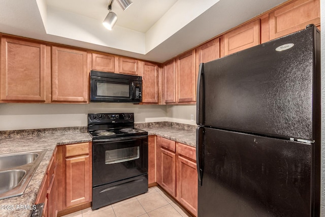 1331 W Baseline Rd Unit 167, Mesa, AZ 85202 - kitchen with black appliances, light tile patterned flooring, track lighting, and a raised ceiling