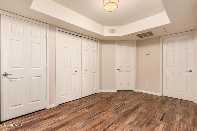 1331 W Baseline Rd Unit 167, Mesa, AZ 85202 - unfurnished bedroom with wood finished floors and a closet