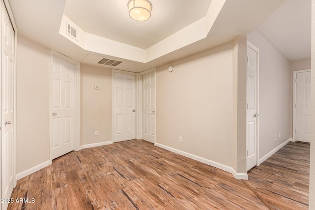 1331 W Baseline Rd Unit 167, Mesa, AZ 85202 - unfurnished bedroom with baseboards and wood finished floors