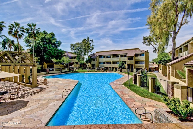 1331 W Baseline Rd Unit 167, Mesa, AZ 85202 - community pool with a patio and a residential view