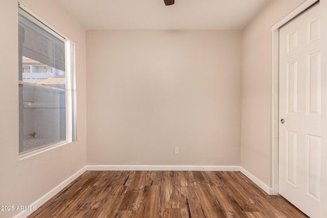 1331 W Baseline Rd Unit 167, Mesa, AZ 85202 - empty room with dark wood finished floors and ceiling fan