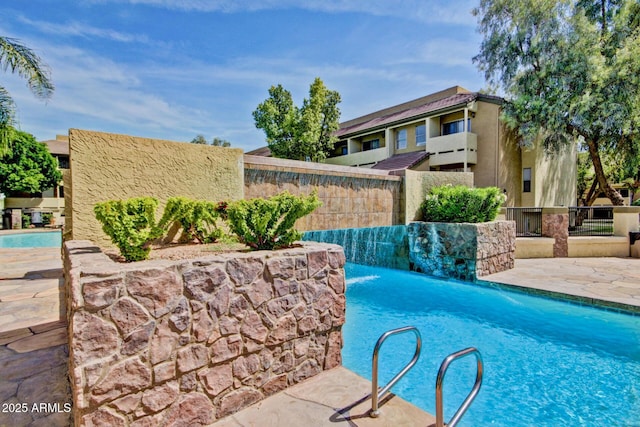 1331 W Baseline Rd Unit 167, Mesa, AZ 85202 - view of swimming pool featuring a patio area