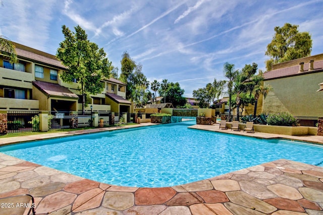 1331 W Baseline Rd Unit 167, Mesa, AZ 85202 - community pool featuring a patio area and a residential view
