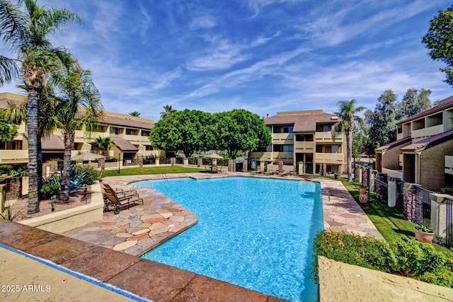 1331 W Baseline Rd Unit 167, Mesa, AZ 85202 - community pool with a patio and a residential view