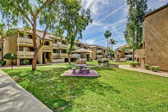 1331 W Baseline Rd Unit 167, Mesa, AZ 85202 - surrounding community featuring a residential view and a yard