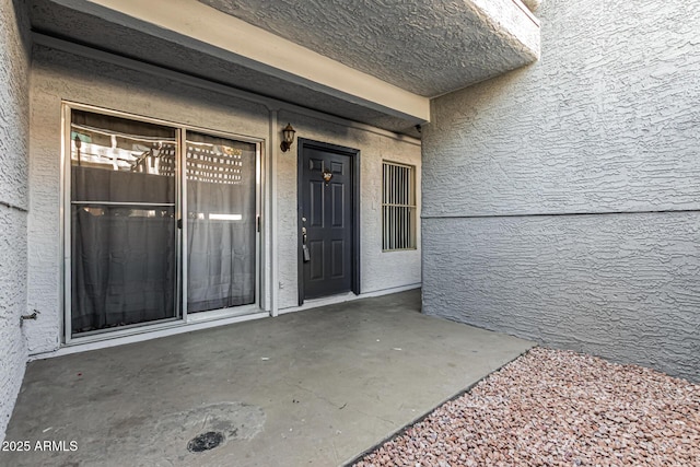 1331 W Baseline Rd Unit 167, Mesa, AZ 85202 - property entrance featuring stucco siding and a patio