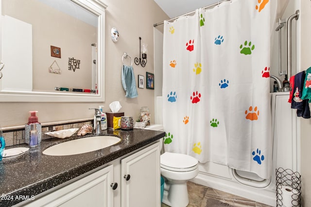 full bathroom featuring vanity, toilet, and shower / bath combo with shower curtain