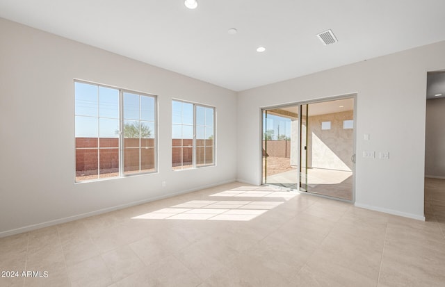 view of tiled spare room