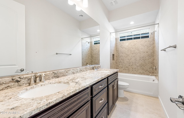 full bathroom with vanity, toilet, tile patterned floors, and tiled shower / bath