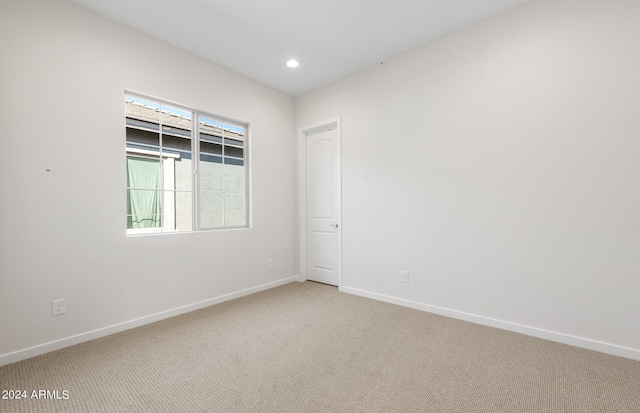 empty room with carpet floors