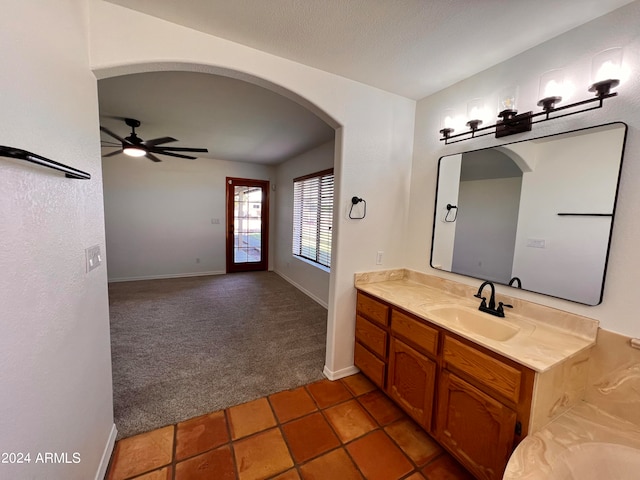 bathroom featuring vanity, tile patterned floors, and ceiling fan