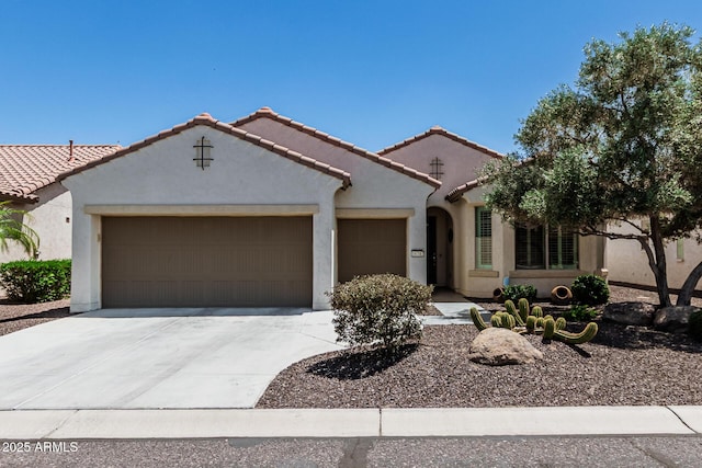 16747 W Berkeley Rd, Goodyear, AZ 85395 - mediterranean / spanish-style house with a garage, driveway, stucco siding, and a tile roof