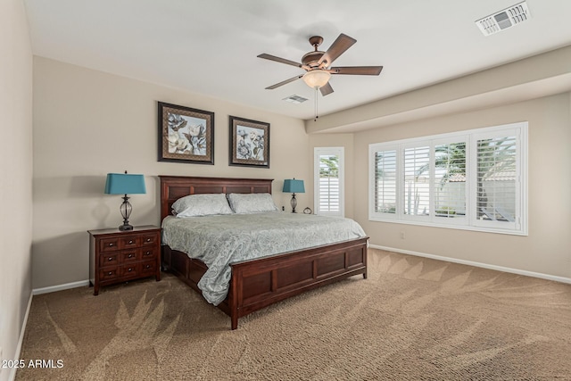 16747 W Berkeley Rd, Goodyear, AZ 85395 - bedroom with baseboards, light colored carpet, and a ceiling fan