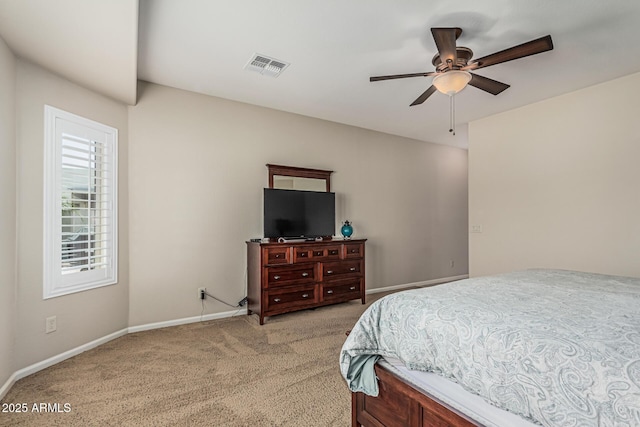 16747 W Berkeley Rd, Goodyear, AZ 85395 - bedroom featuring light carpet, baseboards, and a ceiling fan