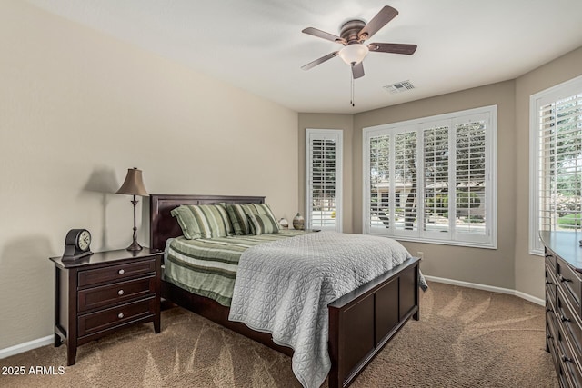 16747 W Berkeley Rd, Goodyear, AZ 85395 - carpeted bedroom featuring baseboards and a ceiling fan