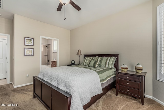 16747 W Berkeley Rd, Goodyear, AZ 85395 - bedroom with carpet floors, baseboards, ensuite bathroom, and a ceiling fan