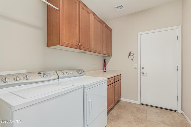 16747 W Berkeley Rd, Goodyear, AZ 85395 - clothes washing area with cabinet space, independent washer and dryer, and baseboards
