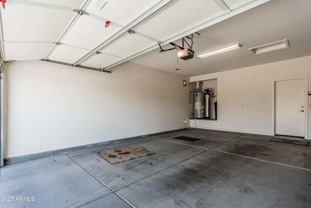 16747 W Berkeley Rd, Goodyear, AZ 85395 - garage featuring a garage door opener and water heater