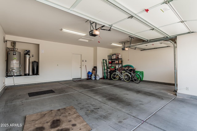 16747 W Berkeley Rd, Goodyear, AZ 85395 - garage featuring gas water heater and a garage door opener