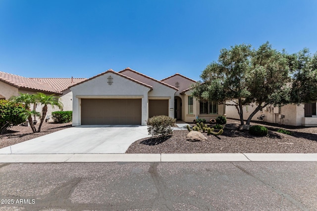 16747 W Berkeley Rd, Goodyear, AZ 85395 - mediterranean / spanish house with an attached garage, stucco siding, driveway, and a tile roof