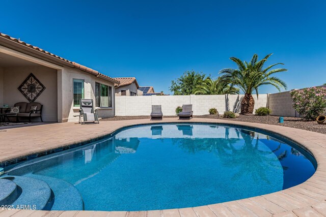 16747 W Berkeley Rd, Goodyear, AZ 85395 - view of pool with a fenced backyard, a patio, and grilling area