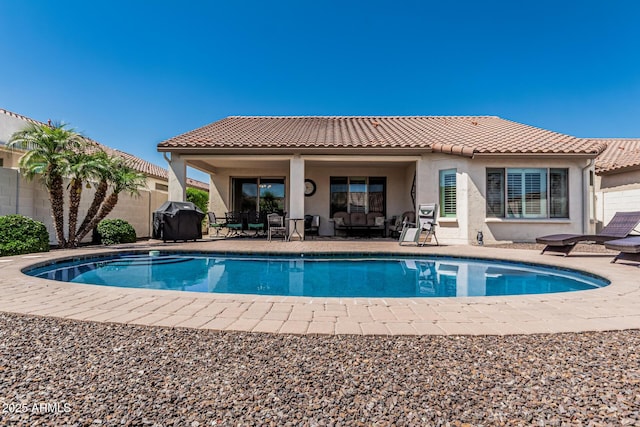 16747 W Berkeley Rd, Goodyear, AZ 85395 - view of swimming pool with an outdoor living space, a patio area, and a grill