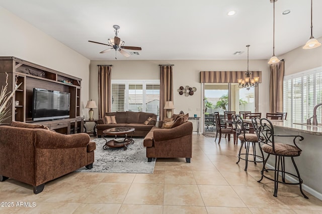 16747 W Berkeley Rd, Goodyear, AZ 85395 - living area featuring ceiling fan, healthy amount of natural light, a chandelier, light tile patterned floors, and recessed lighting