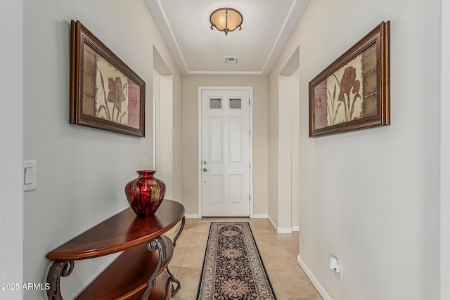 16747 W Berkeley Rd, Goodyear, AZ 85395 - doorway to outside with baseboards and light tile patterned flooring