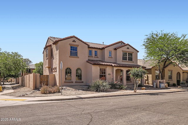1710 S Parkcrest St, Gilbert, AZ 85295 - mediterranean / spanish-style house with a tiled roof and stucco siding