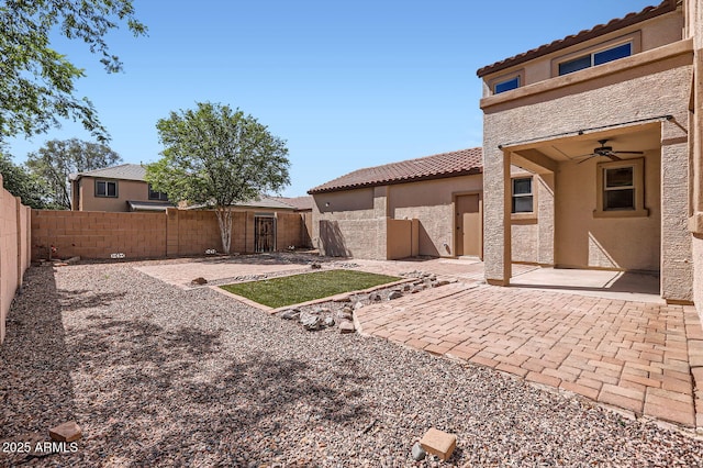 1710 S Parkcrest St, Gilbert, AZ 85295 - fenced backyard featuring a ceiling fan and a patio